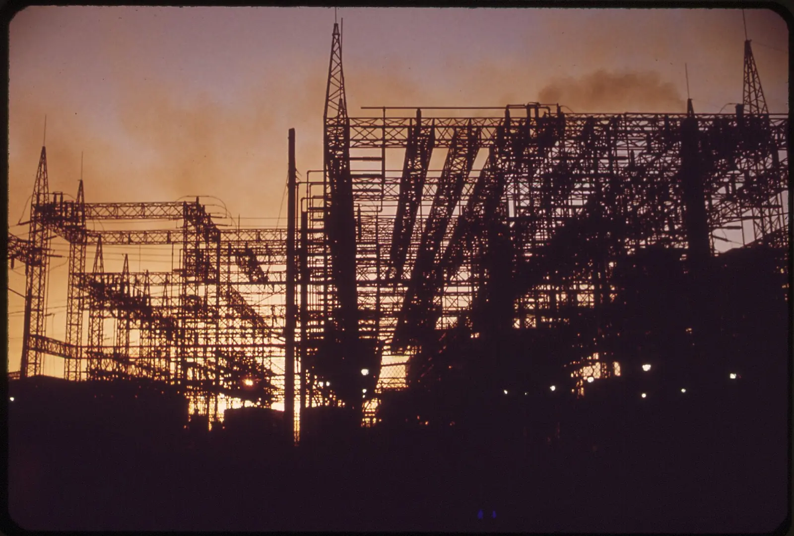 A petrochemical plant silhouetted at dusk